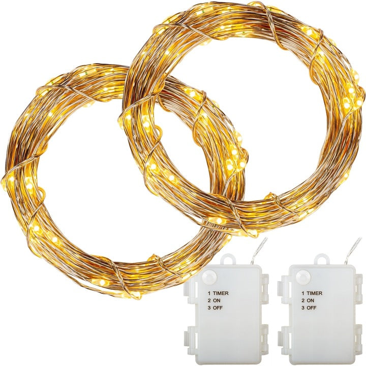 Set de 2 instalatii cu 50 de led-uri, alimentare cu baterie, cald